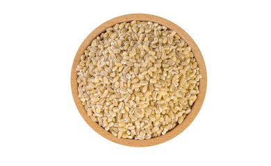 pearl barley in wooden bowl isolated on white background. nutrition. food ingredient.top view.