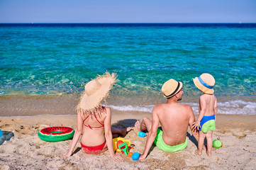 Family on beach in Greece