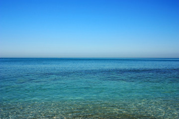 Extensive smooth water surface of the Ligurian Sea