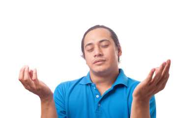 Young Man with Calm Yoga Gesture