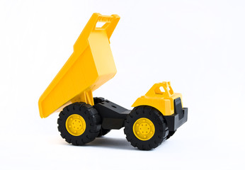 yellow toy dump truck on white background