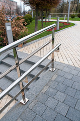 railing and pavement in recreation areas and near architectural buildings