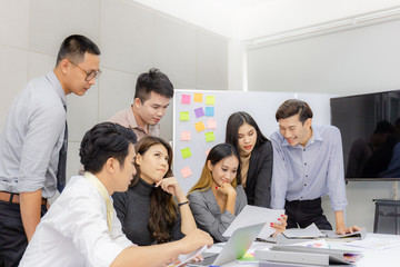 Selective focus of Success group of business people team meeting working with laptop in office
