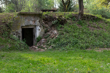 Fototapeta na wymiar abandoned bunker in forest
