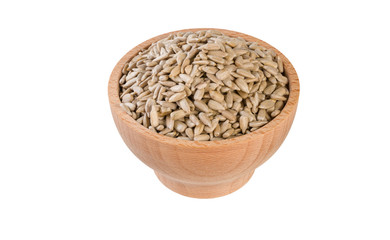 sunflower seed in wooden bowl isolated on white background. nutrition. food ingredient.