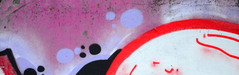 Naklejka premium Fragment of colored street art graffiti paintings with contours and shading close up