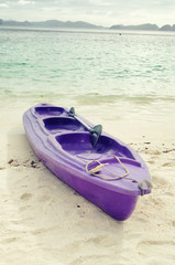 Active holiday at the sea. Old kayak.