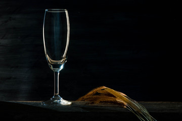 Empty wine glass on a black background