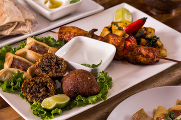 Arab Food, Kibe, Sfiha, Shish taouk, lemon, white sauce