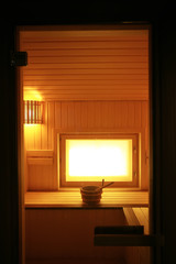 Fototapeta premium sauna, wooden interior baths, wooden benches and loungers accessories for sauna, spa complex in the hotel