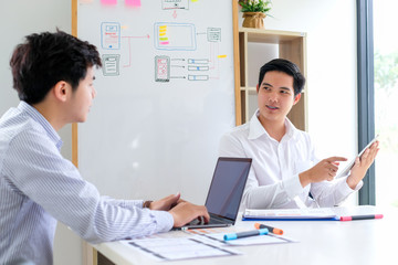 Graphic designers creative drawing website ux app development and application for mobile phone in the office.