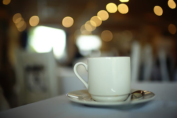 English tea in a cafe / cup and kettle with five o'clock tea