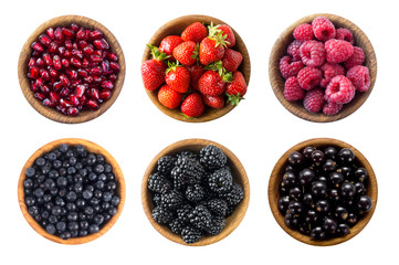 Berries and fruits isolated on white. Collage of different fruits and berries at black and red color. 