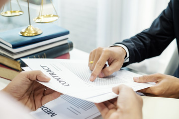 Lawyer and businessman consultation and signed the agreement treaty.