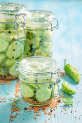 Closeup of homemade and tasty pickled cucumber in the jar