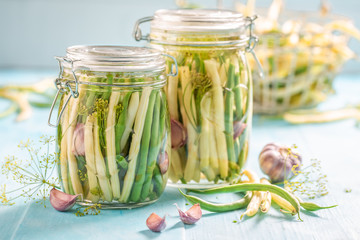 Pickled yellow and green beans in the jar
