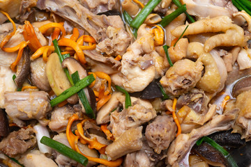 fresh steamed chicken with slices of mushrooms