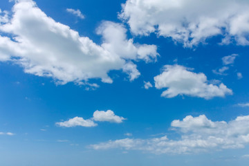 Naklejka na ściany i meble Blackground texture blue sky with white clouds in suny day.