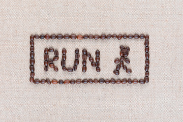 Run sign in rectangle on linea texture shot close up.