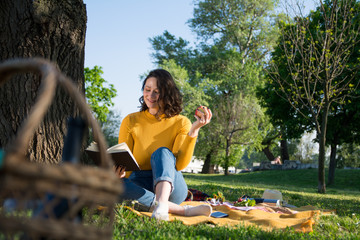 Woman enjoys a picnic