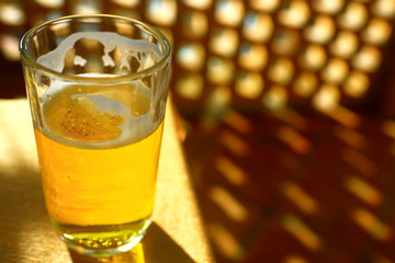 A glass of beer on a table
