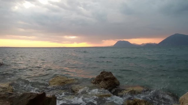 Sunset view from Patras Greece. Cloudy weather, winter atmosphere.