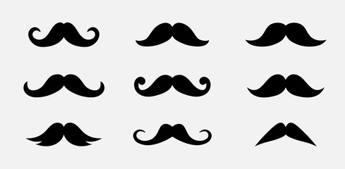 Set of black mustache icons. Hipster design elements. Mustache silhouettes isolated on white background. Vector illustration.