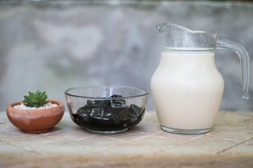 fresh milk with black grass jelly and cactus 