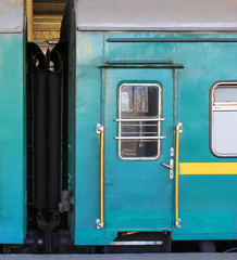 Fototapeta na wymiar Vintage commuter train at railway station