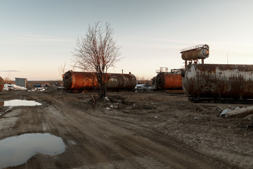 Old rusty oil separators, oil tanks