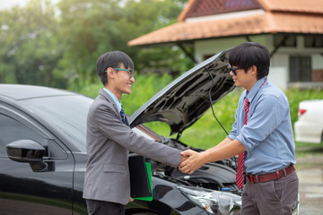Fototapeta na wymiar Insurance agent handshake with customer. Car insurance.
