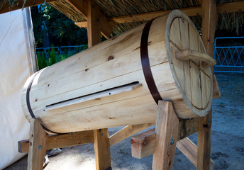 Sloping wooden houses for bees placed on a stand