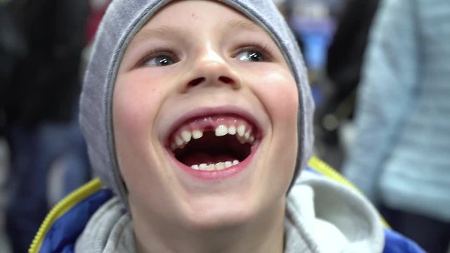 Boy without a tooth. Baby teeth. Changing teeth. Consequences of eating sweets. Oral care. Molars dentistry. Calcium.