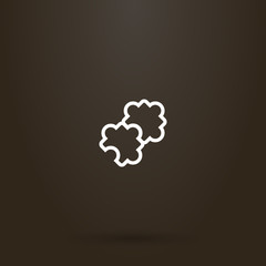 white sign on a black background. simple vector line art sign of two connected puzzles