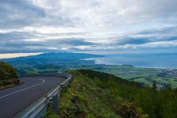 Empty road, with scenic landscape view to Ribeira Grande Coast in Sao Miguel island, Azores, Portugal