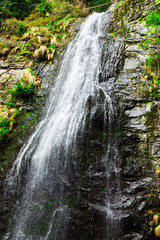 high mountain waterfall in the woods , Yalinsky mountain waterfall , Ukraine , Carpathians