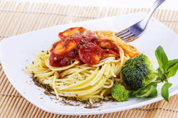 Sapaghetti sauce on white plate isolated