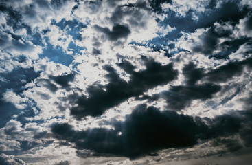 Obraz premium blue sky texture with gloomy clouds. Design wallpaper with space for text.