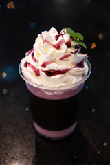 blueberry smoothie on top of table