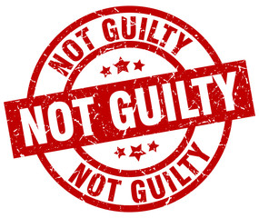 not guilty round red grunge stamp