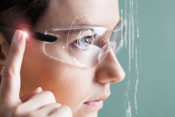 Woman in glasses with virtual screen