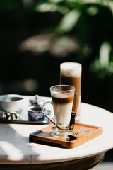 cup of coffee on wooden table