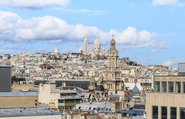 Paris skyline with the Basilica of Sacre Coeur, Montmartre in background. Landmark of Paris, France