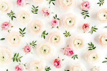 Floral background texture made of pink ranunculusand rose flower buds and eucalyptus leaves on white background.  Flat lay, top view floral background.