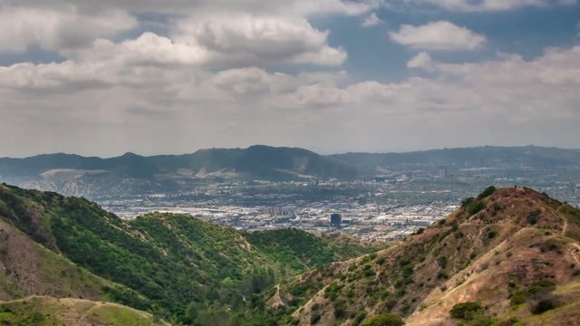 View to downtown Los Angeles and San Fernando Valley from Verdugo Mountains, Burbank, California - time lapse video, 4k
