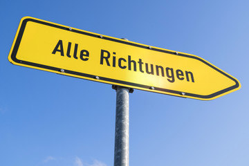 German road sign: signpost at junction (all directions)