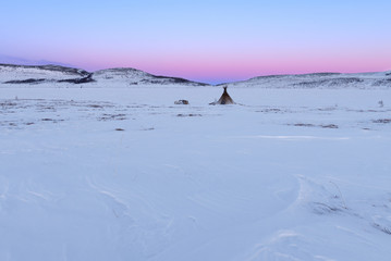 Sunset over nomad fisherman camp in the Arctic tundra. Polar Ural.