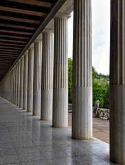 Stoa of Attalos in Athens, Greece. Impressive building in Ancient Agora archeological site. Great perspective from columns.
