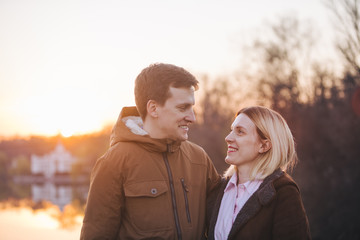 couple looking on each other on sunset