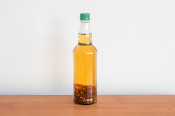 Bottle of amber tincture. Tincture made with spirit and Baltic Sea amber.